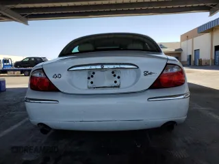 2000 Jaguar S-Type V8 z VIN SAJDA01D7YGL39410, wystawiony jako Copart lot #56814185 z przebiegiem 47 861 mil mil oraz Szkody całkowita. Historia ofert i sprzedaży dostępna na DreamBid. Obrazek 6.