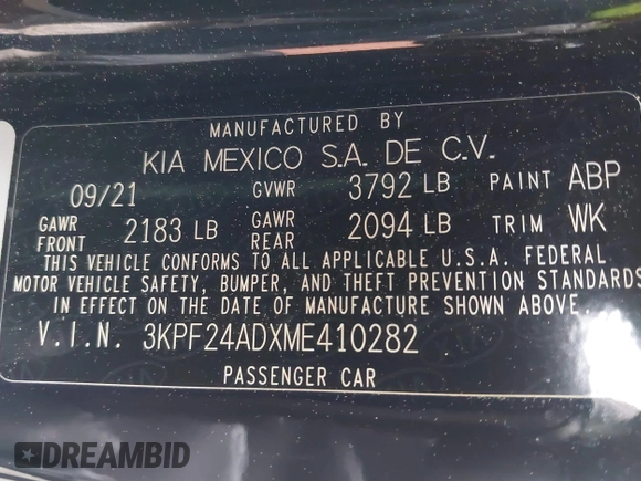 2021 Kia Forte LXS with VIN 3KPF24ADXME410282, listed as a IAAI auction lot 42004328 with 62,817 mi miles. Bid and sale history available at carsss.com. Image 9.