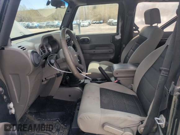 2010 Jeep Wrangler Sport with VIN 1J4AA2D16AL127197, listed as a Copart auction lot 54192935 with 200,595 mi miles and Clean Title. Bid and sale history available at carsss.com. Image 7.