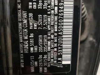 2013 Hyundai Santa Fe Sport z VIN 5XYZUDLA5DG076949, wystawiony jako Copart lot #55758515 z przebiegiem 168 636 mil mil oraz Szkoda całkowita • Salvage title. Historia ofert i sprzedaży dostępna na DreamBid. Obrazek 13.