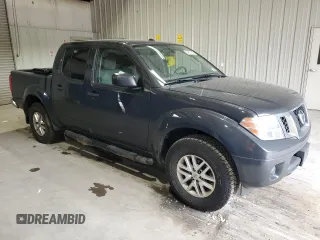 2015 Nissan Frontier Pro-4X with VIN 1N6AD0EV3FN732242, listed as a Copart auction lot 54837815 with 215,576 mi miles and Clean title. Bid and sale history available at DreamBid. Image 4.