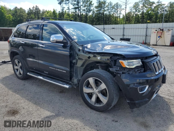 2016 Jeep Grand Cherokee Overland with VIN 1C4RJFCM9GC302353, listed as a Copart auction lot 58789604 with 87,826 mi miles and Clean title. Bid and sale history available at DreamBid. Image 4.