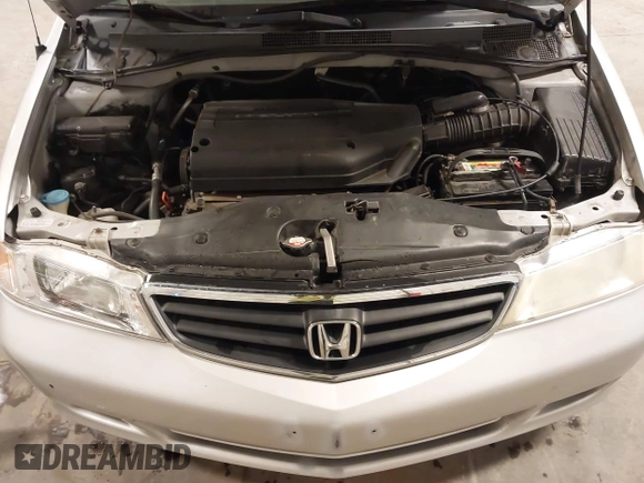 2004 Honda Odyssey EX-L with VIN 5FNRL18974B127696, listed as a IAAI auction lot 41643243 with 200,286 mi miles and . Bid and sale history available at DreamBid. Image 10.