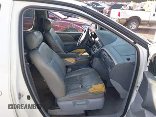 1999 Toyota Sienna LE with VIN 4T3ZF13C5XU161001, listed as a IAAI auction lot 41309712 with 364,688 mi miles. Bid and sale history available at carsss.com. Image 5.