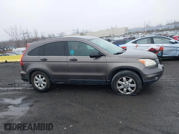 2011 Honda CR-V SE with VIN 5J6RE4H49BL110385, listed as a IAAI auction lot 41091191 with 209,187 mi miles. Bid and sale history available at carsss.com. Image 12.