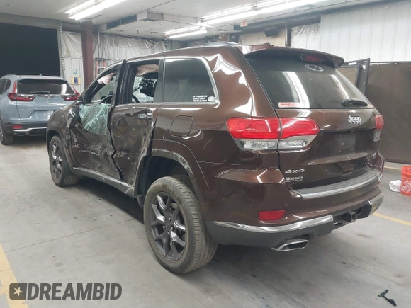 2014 Jeep Grand Cherokee Summit with VIN 1C4RJFJT6EC346575, listed as a IAAI auction lot 41881795 with 148,941 mi miles and . Bid and sale history available at DreamBid. Image 3.