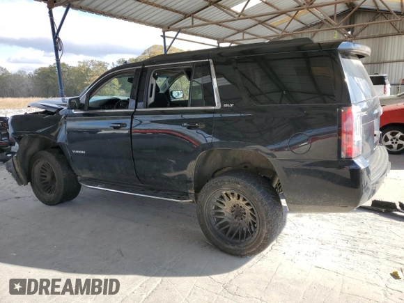 2019 GMC Yukon SLT with VIN 1GKS2BKCXKR108358, listed as a Copart auction lot 83765624 with 127,724 mi miles and Salvage Title. Bid and sale history available at carsss.com. Image 2.