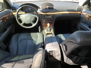2003 Mercedes-Benz E-Class 3.2L with VIN WDBUF65J03A281430, listed as a Copart auction lot 77086054 with 121,080 mi miles and Salvage Title. Bid and sale history available at carsss.com. Image 8.