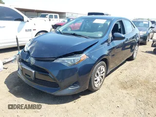 2019 Toyota Corolla L with VIN 2T1BURHE6KC185004, listed as a IAAI auction lot 42105629 with 111,907 mi miles. Bid and sale history available at carsss.com. Image 2.