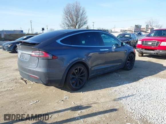2020 Tesla Model X Long Range with VIN 5YJXCBE2XLF230629, listed as a IAAI auction lot 41925961 with 35,979 mi miles. Bid and sale history available at carsss.com. Image 4.