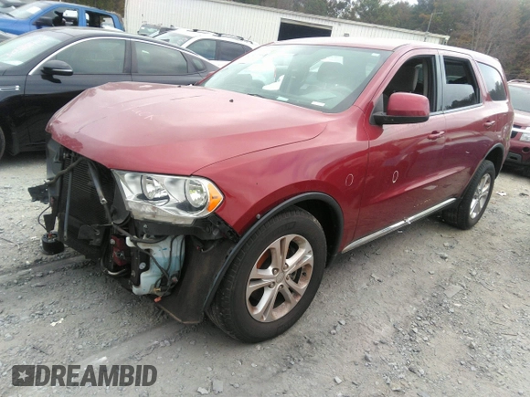 2013 Dodge Durango SXT with VIN 1C4RDHAG0DC694859, listed as a IAAI auction lot 40809655 with 190,130 mi miles and . Bid and sale history available at DreamBid. Image 2.