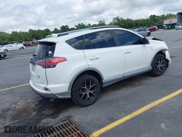 2017 Toyota RAV4 SE with VIN 2T3JFREV7HW637809, listed as a IAAI auction lot 42472464 with 173,273 mi miles and . Bid and sale history available at DreamBid. Image 4.