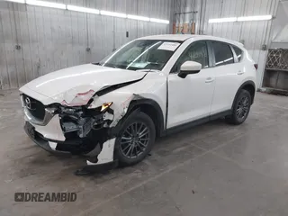 2017 Mazda CX-5 Touring with VIN JM3KFBCL9H0107589, listed as a IAAI auction lot 41241481 with 77,032 mi miles. Bid and sale history available at carsss.com. Image 2.