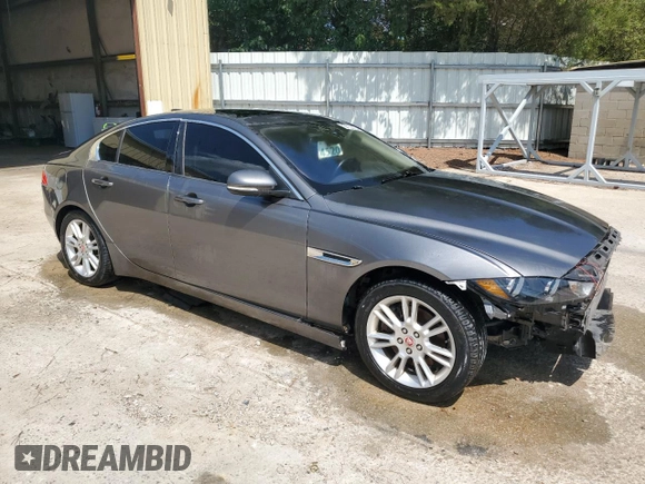 2017 Jaguar XE with VIN SAJAD4BNXHA975573, listed as a Copart auction lot 61804594 with 103,255 mi miles and Clean Title. Bid and sale history available at DreamBid. Image 4.