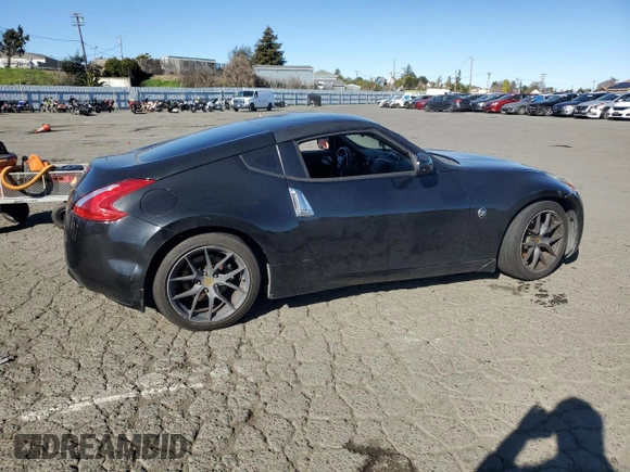 2012 Nissan 370Z Touring with VIN JN1AZ4EH4CM561432, listed as a Copart auction lot 89376935 with 128,955 mi miles and Salvage Title. Bid and sale history available at carsss.com. Image 3.