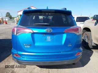 2016 Toyota RAV4 LE with VIN JTMBFREV2GD183811, listed as a IAAI auction lot 42216793 with 95,270 mi miles and . Bid and sale history available at DreamBid. Image 16.