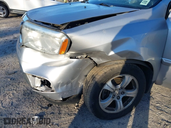 2015 Honda Pilot EX-L with VIN 5FNYF4H57FB006655, listed as a IAAI auction lot 41822385 with 125,915 mi miles and . Bid and sale history available at carsss.com. Image 6.
