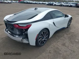 2016 BMW i8 with VIN WBY2Z2C53GV675600, listed as a IAAI auction lot 42079477 with 26,756 mi miles. Bid and sale history available at carsss.com. Image 4.