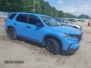 2025 Honda Pilot TrailSport z VIN 5FNYG1H65SB025896, wystawiony jako IAAI lot #42142095 z przebiegiem 15 065 mil mil oraz . Historia ofert i sprzedaży dostępna na DreamBid. Obrazek 1.