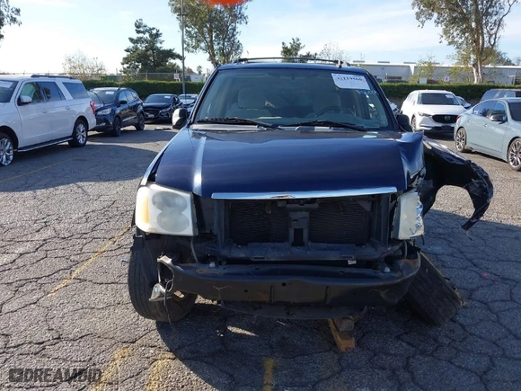 2007 GMC Envoy SLE with VIN 1GKDS13S072127977, listed as a IAAI auction lot 41119560 with 136,291 mi miles. Bid and sale history available at carsss.com. Image 12.