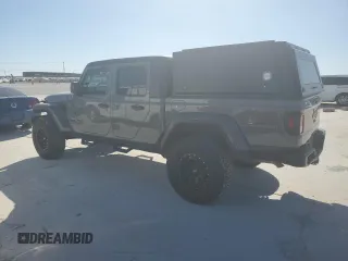 2022 Jeep Gladiator Texas Trail with VIN 1C6HJTAG8NL103449, listed as a Copart auction lot 49823595 with 60,902 mi miles and Salvage Title. Bid and sale history available at carsss.com. Image 2.