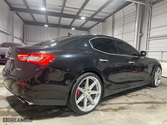 2014 Maserati Ghibli S Q4 with VIN ZAM57RTA9E1112724, listed as a Copart auction lot 53585485 with 45,525 mi miles and Salvage Title. Bid and sale history available at carsss.com. Image 4.