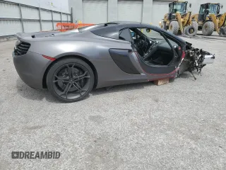 2016 McLaren 650S z VIN SBM11FAA5GW006080, wystawiony jako Copart lot #48061065 z przebiegiem 36 645 mil mil oraz Szkody całkowita. Historia ofert i sprzedaży dostępna na DreamBid. Obrazek 3.