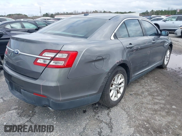 2014 Ford Taurus SE z VIN 1FAHP2D88EG143275, wystawiony jako IAAI lot #41801787 z przebiegiem 150 988 mil mil oraz . Historia ofert i sprzedaży dostępna na DreamBid. Obrazek 4.