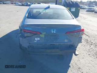 2022 Honda Civic Sport z VIN 2HGFE2F50NH601567, wystawiony jako IAAI lot #40880687 z przebiegiem 16 587 mil mil oraz . Historia ofert i sprzedaży dostępna na DreamBid. Obrazek 6.