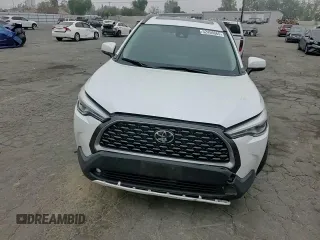 2022 Toyota Corolla Cross XLE with VIN 7MUDAAAG6NV014706, listed as a Copart auction lot 52456065 with 31,041 mi miles and Salvage title. Bid and sale history available at DreamBid. Image 12.