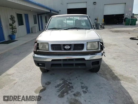 1998 Nissan Frontier XE z VIN 1N6DD21S8WC342950, wystawiony jako Copart lot #42089915 z przebiegiem Nie podano mil oraz Szkoda całkowita • Salvage title. Historia ofert i sprzedaży dostępna na DreamBid. Obrazek 10.