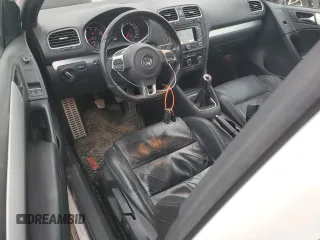 2012 Volkswagen GTI PZEV z VIN WVWED7AJ9CW107107, wystawiony jako Copart lot #43623155 z przebiegiem 193 560 mil mil oraz Szkoda całkowita • Salvage title. Historia ofert i sprzedaży dostępna na DreamBid. Obrazek 8.
