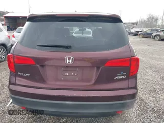 2016 Honda Pilot EX-L with VIN 5FNYF6H58GB072368, listed as a IAAI auction lot 41055222 with 130,813 mi miles. Bid and sale history available at carsss.com. Image 16.