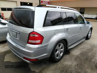 2012 Mercedes-Benz GL-Class GL 450 with VIN 4JGBF7BE1CA777189, listed as a IAAI auction lot 42201396 with 213,114 mi miles. Bid and sale history available at carsss.com. Image 4.
