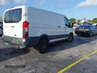 2017 Ford Transit with VIN 1FTYR1ZM0HKA94157, listed as a IAAI auction lot 41934912 with 114,777 mi miles and . Bid and sale history available at DreamBid. Image 4.