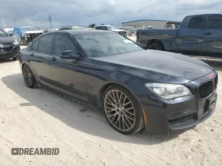 2015 BMW 7 Series 750i with VIN WBAYA8C59FG197642, listed as a Copart auction lot 70282884 with 130,853 mi miles and Salvage title. Bid and sale history available at DreamBid. Image 4.