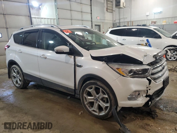 2019 Ford Escape Titanium with VIN 1FMCU9J97KUC37529, listed as a Copart auction lot 42243404 with 37,677 mi miles and Salvage Title. Bid and sale history available at carsss.com. Image 4.