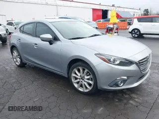 2014 Mazda 3 S Grand Touring with VIN JM1BM1M32E1196631, listed as a IAAI auction lot 41623598 with 98,507 mi miles and . Bid and sale history available at DreamBid. Image 1.