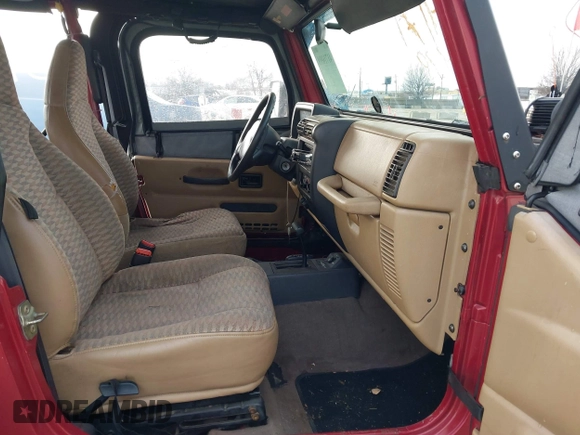 1999 Jeep Wrangler SE with VIN 1J4FY29P6XP408738, listed as a IAAI auction lot 41716999 with 124,692 mi miles. Bid and sale history available at carsss.com. Image 5.