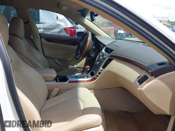 2012 Cadillac CTS Performance z VIN 1G6DK5E34C0116367, wystawiony jako IAAI lot #42373255 z przebiegiem 93 444 mil mil oraz . Historia ofert i sprzedaży dostępna na DreamBid. Obrazek 5.
