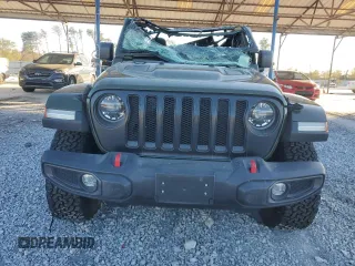 2021 Jeep Wrangler Unlimited Rubicon с VIN 1C4HJXFN6MW652765, выставлен на аукционе Copart как лот 81967164 с пробегом 52 380 миль миль и Списание • Salvage title. История ставок и продаж доступна на DreamBid. Изображение 5.