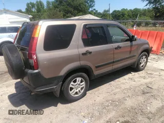 2002 Honda CR-V EX with VIN SHSRD78852U006582, listed as a IAAI auction lot 42145553 with 240,385 mi miles. Bid and sale history available at carsss.com. Image 4.