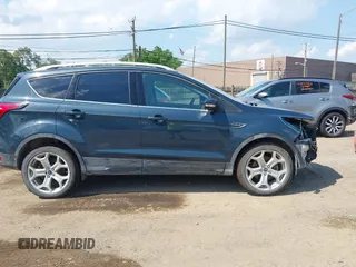 2019 Ford Escape Titanium with VIN 1FMCU9J99KUC00935, listed as a IAAI auction lot 42583250 with 91,241 mi miles and . Bid and sale history available at DreamBid. Image 14.