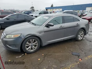 2012 Ford Taurus SEL z VIN 1FAHP2HW9CG103826, wystawiony jako Copart lot #86323774 z przebiegiem 227 186 mil mil oraz Czysty tytuł • Clean title. Historia ofert i sprzedaży dostępna na DreamBid. Obrazek 1.