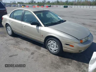 2001 Saturn SL z VIN 1G8ZK52781Z224746, wystawiony jako IAAI lot #41811796 z przebiegiem 207 943 mil mil oraz . Historia ofert i sprzedaży dostępna na DreamBid. Obrazek 1.