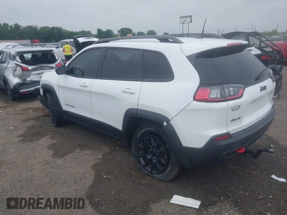 2021 Jeep Cherokee Trailhawk with VIN 1C4PJMBX4MD239112, listed as a IAAI auction lot 42271040 with 62,917 mi miles and . Bid and sale history available at DreamBid. Image 3.