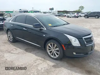 2014 Cadillac XTS Luxury with VIN 2G61M5S36E9221258, listed as a IAAI auction lot 42063739 with 91,231 mi miles and . Bid and sale history available at DreamBid. Image 1.