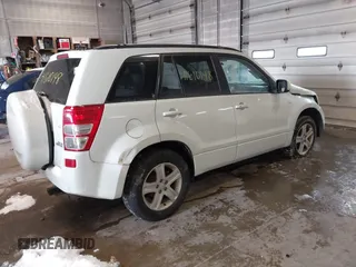 2006 Suzuki Grand Vitara Luxury with VIN JS3TD947764101438, listed as a IAAI auction lot 41610148 with 172,483 mi miles and . Bid and sale history available at DreamBid. Image 4.