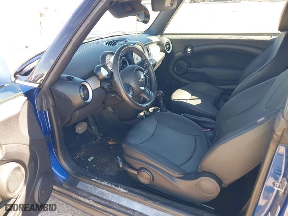 2013 MINI Cooper Convertible with VIN WMWZN3C56DT135566, listed as a IAAI auction lot 41414064 with 58,593 mi miles. Bid and sale history available at carsss.com. Image 5.
