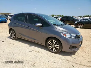 2020 Honda Fit EX with VIN 3HGGK5H8XLM716391, listed as a Copart auction lot 61165085 with 91,399 mi miles and Salvage title. Bid and sale history available at DreamBid. Image 4.